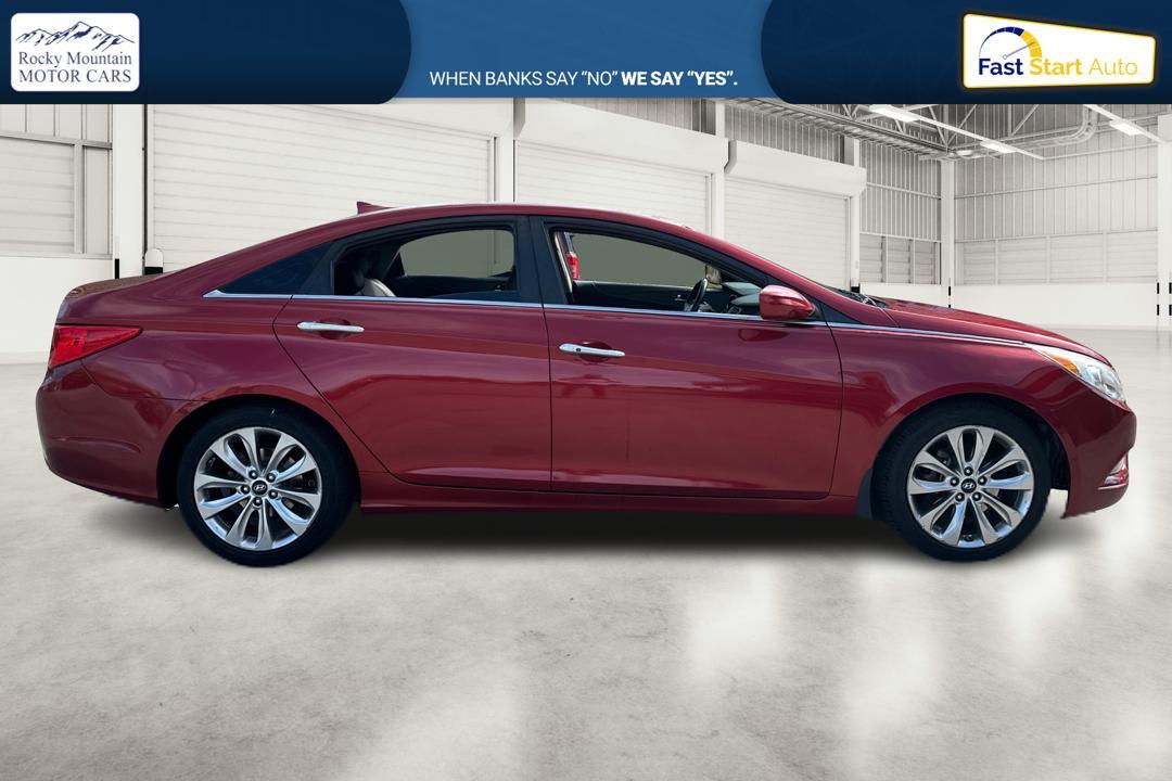 2013 Red Hyundai Sonata Limited Auto (5NPEC4AC9DH) with an 2.4L L4 DOHC 16V engine, 6-Speed Automatic transmission, located at 767 S State Road, Pleasant Grove, UT, 84062, (801) 785-1058, 40.354839, -111.736687 - Photo #1
