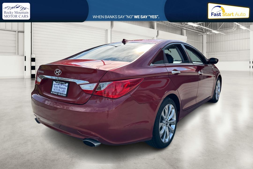 2013 Red Hyundai Sonata Limited Auto (5NPEC4AC9DH) with an 2.4L L4 DOHC 16V engine, 6-Speed Automatic transmission, located at 767 S State Road, Pleasant Grove, UT, 84062, (801) 785-1058, 40.354839, -111.736687 - Photo #2