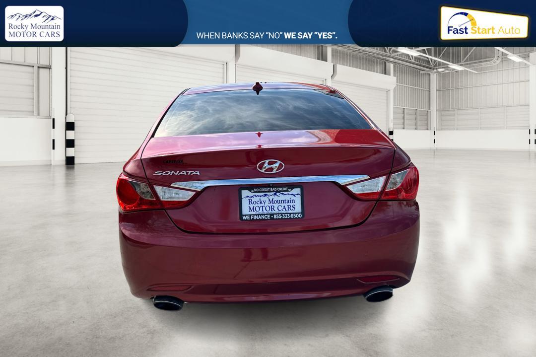 2013 Red Hyundai Sonata Limited Auto (5NPEC4AC9DH) with an 2.4L L4 DOHC 16V engine, 6-Speed Automatic transmission, located at 767 S State Road, Pleasant Grove, UT, 84062, (801) 785-1058, 40.354839, -111.736687 - Photo #3