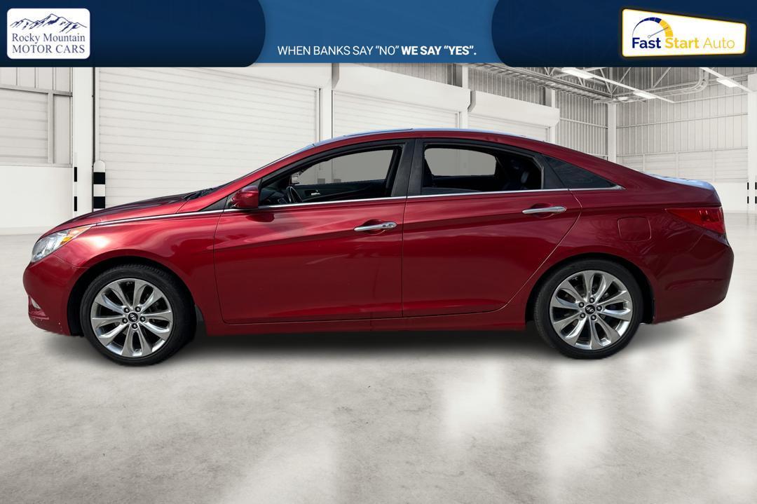 2013 Red Hyundai Sonata Limited Auto (5NPEC4AC9DH) with an 2.4L L4 DOHC 16V engine, 6-Speed Automatic transmission, located at 767 S State Road, Pleasant Grove, UT, 84062, (801) 785-1058, 40.354839, -111.736687 - Photo #5