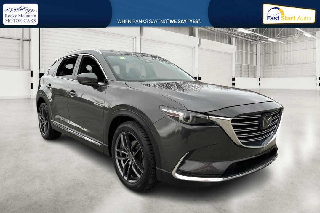 2017 Gray Mazda CX-9 Grand Touring AWD (JM3TCBDY6H0) with an 2.5L L4 DOHC 16V engine, 6A transmission, located at 344 S Washington Blvd, Ogden, UT, 84404, (801) 399-1799, 41.255482, -111.970848 - Photo #0