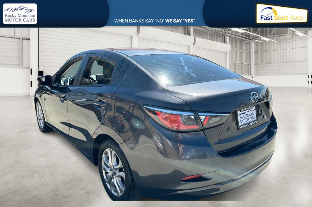 2016 Gray Scion iA 6A (3MYDLBZV0GY) with an 1.5L L4 DOHC 16V engine, 6A transmission, located at 344 S Washington Blvd, Ogden, UT, 84404, (801) 399-1799, 41.255482, -111.970848 - Photo #4