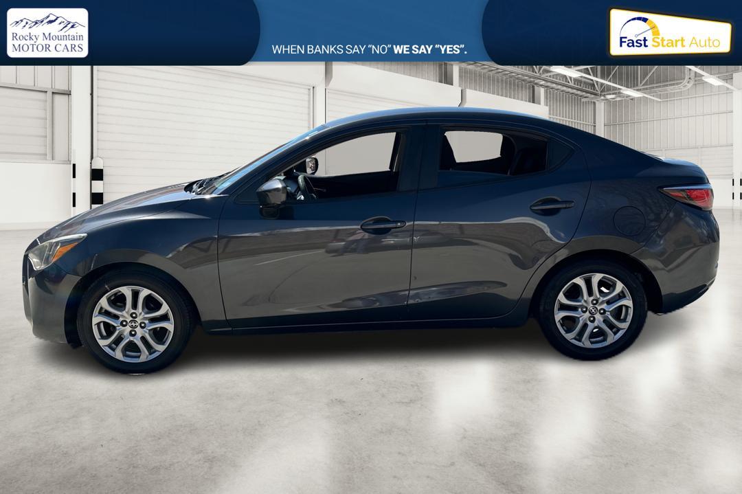 2016 Gray Scion iA 6A (3MYDLBZV0GY) with an 1.5L L4 DOHC 16V engine, 6A transmission, located at 344 S Washington Blvd, Ogden, UT, 84404, (801) 399-1799, 41.255482, -111.970848 - Photo #5
