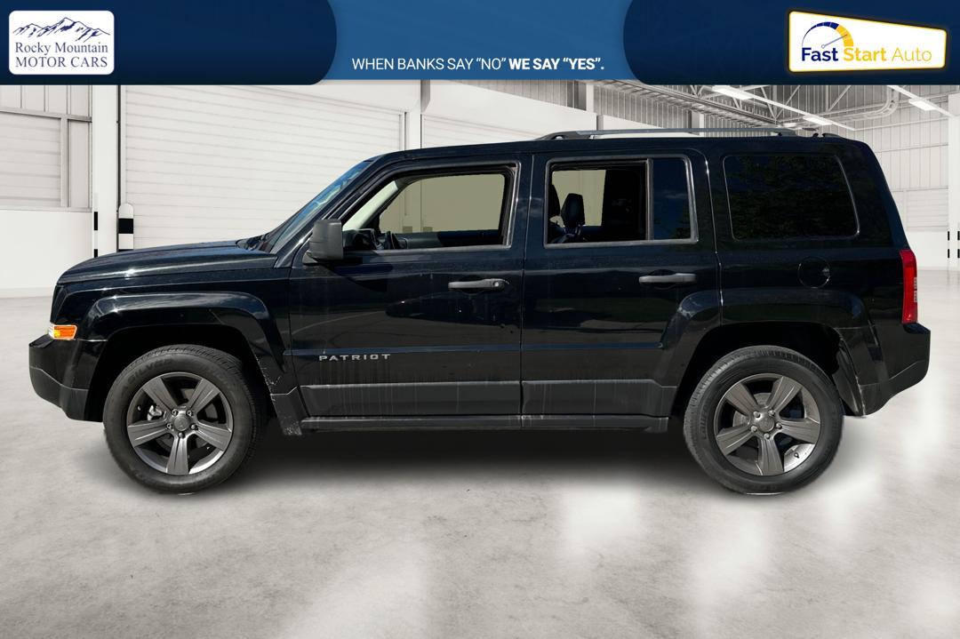 2017 Black Jeep Patriot Sport 2WD (1C4NJPBAXHD) with an 2.0L L4 DOHC 16V engine, Auto, 6-Spd AutoStick transmission, located at 767 S State Road, Pleasant Grove, UT, 84062, (801) 785-1058, 40.354839, -111.736687 - Photo #5