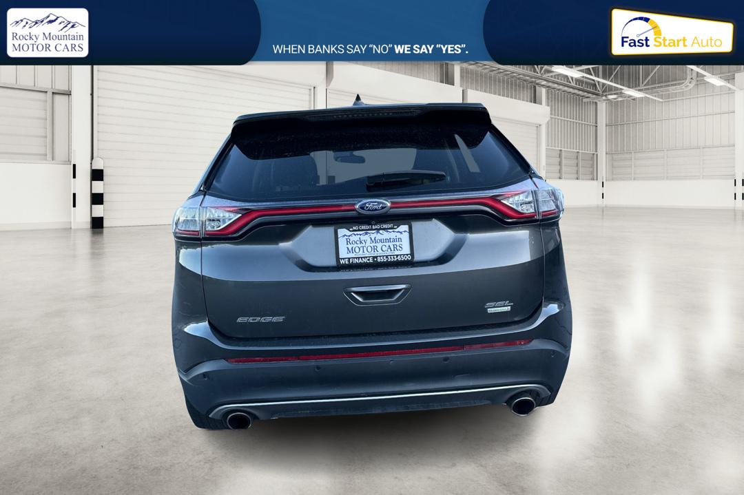 2017 Gray Ford Edge SEL FWD (2FMPK3J93HB) with an 2.0L L4 DOHC 16V engine, 6A transmission, located at 767 S State Road, Pleasant Grove, UT, 84062, (801) 785-1058, 40.354839, -111.736687 - Photo#4