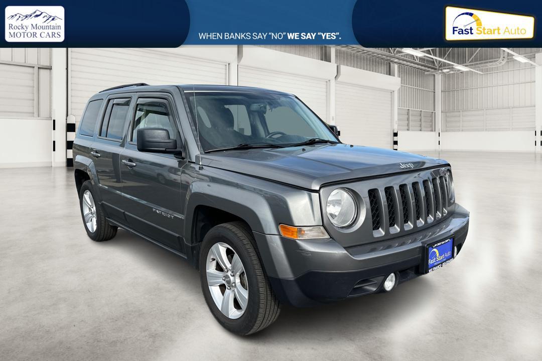 2014 Gray Jeep Patriot Latitude 2WD (1C4NJPFA4ED) with an 2.0L L4 DOHC 16V engine, Automatic, 6-Spd w/AutoStick transmission, located at 7755 State Street, Midvale, UT, 84047, (801) 753-9063, 40.610329, -111.892159 - Photo #0