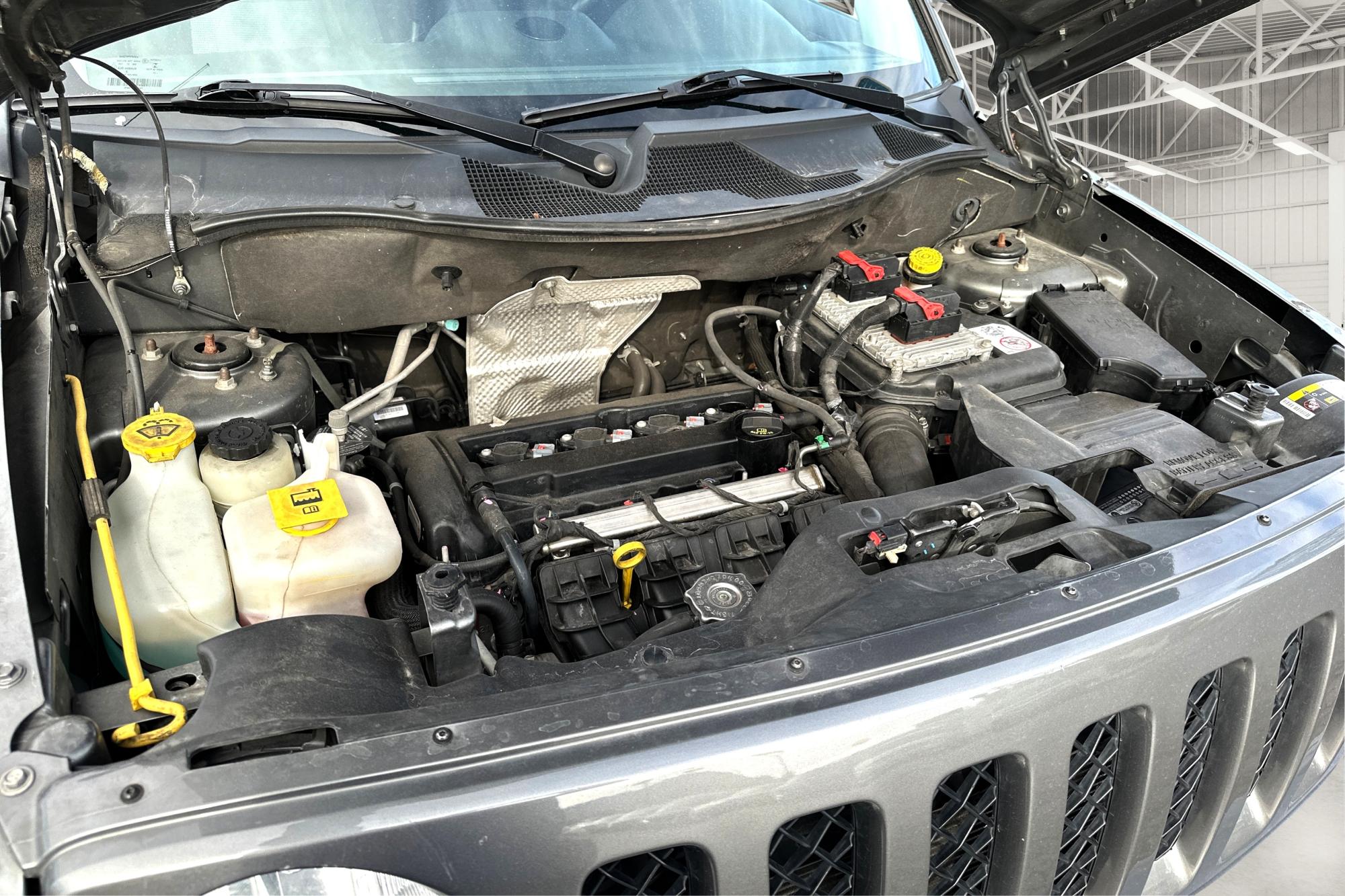 2014 Gray Jeep Patriot Latitude 2WD (1C4NJPFA4ED) with an 2.0L L4 DOHC 16V engine, Automatic, 6-Spd w/AutoStick transmission, located at 7755 State Street, Midvale, UT, 84047, (801) 753-9063, 40.610329, -111.892159 - Photo #8
