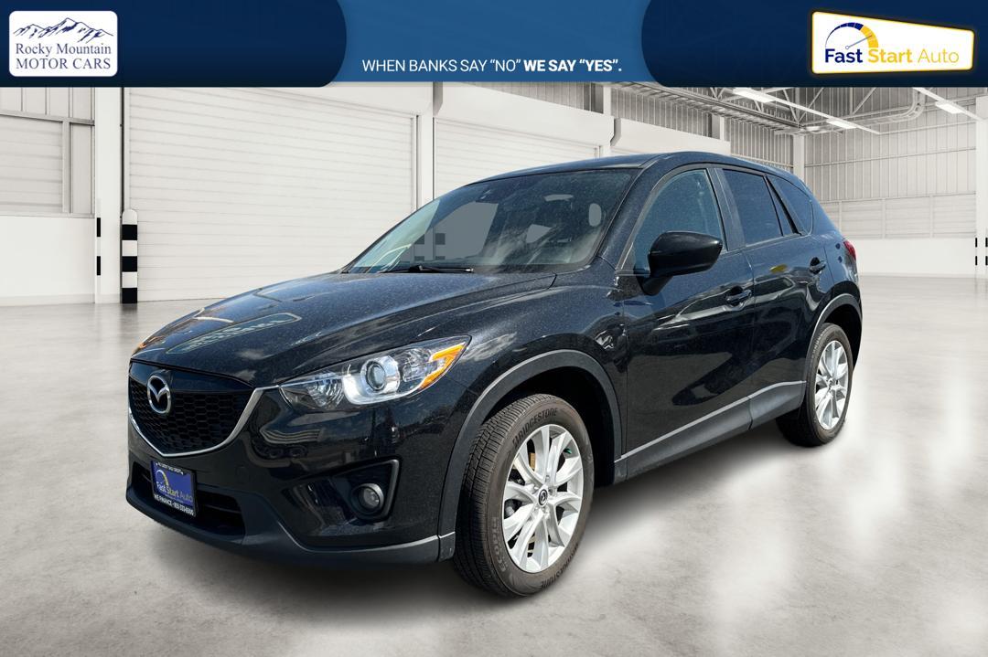 2014 Black Mazda CX-5 Grand Touring AWD (JM3KE4DY8E0) with an 2.5L L4 DOHC 16V engine, 6-Speed Automatic transmission, located at 7755 State Street, Midvale, UT, 84047, (801) 753-9063, 40.610329, -111.892159 - Photo #6