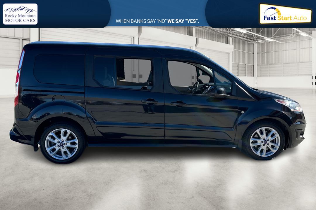 2015 Black Ford Transit Connect Wagon Titanium w/Rear Liftgate LWB (NM0GE9G72F1) with an 2.5L L4 DOHC 16V engine, 6-Speed Automatic transmission, located at 767 S State Road, Pleasant Grove, UT, 84062, (801) 785-1058, 40.354839, -111.736687 - Photo #1