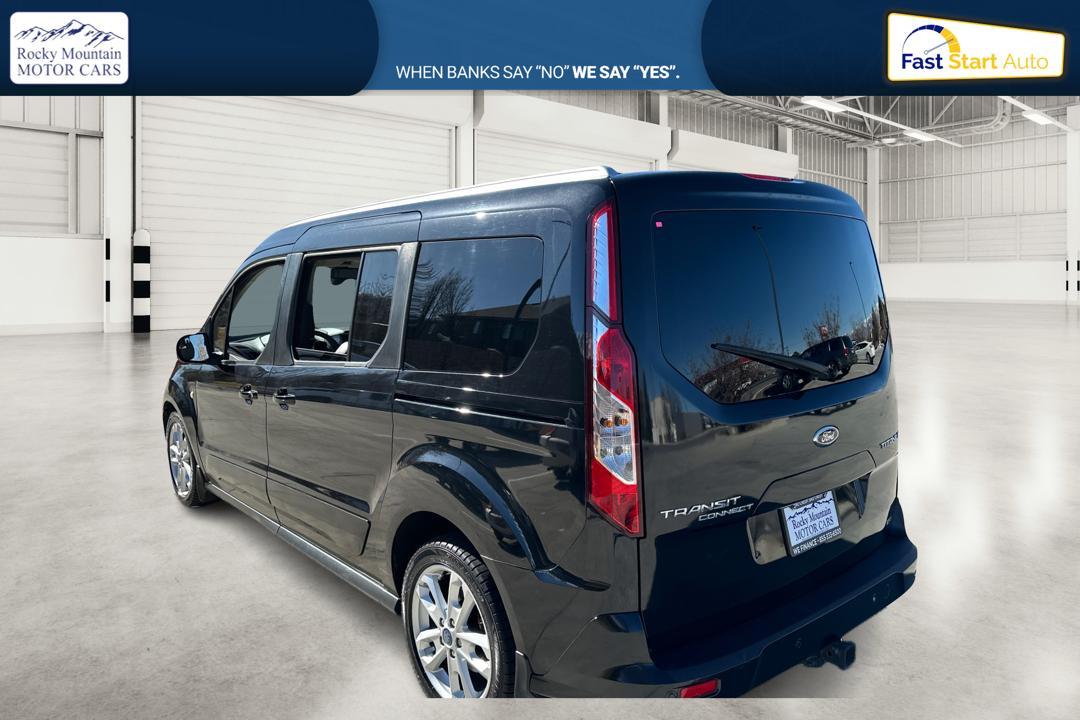 2015 Black Ford Transit Connect Wagon Titanium w/Rear Liftgate LWB (NM0GE9G72F1) with an 2.5L L4 DOHC 16V engine, 6-Speed Automatic transmission, located at 767 S State Road, Pleasant Grove, UT, 84062, (801) 785-1058, 40.354839, -111.736687 - Photo #4