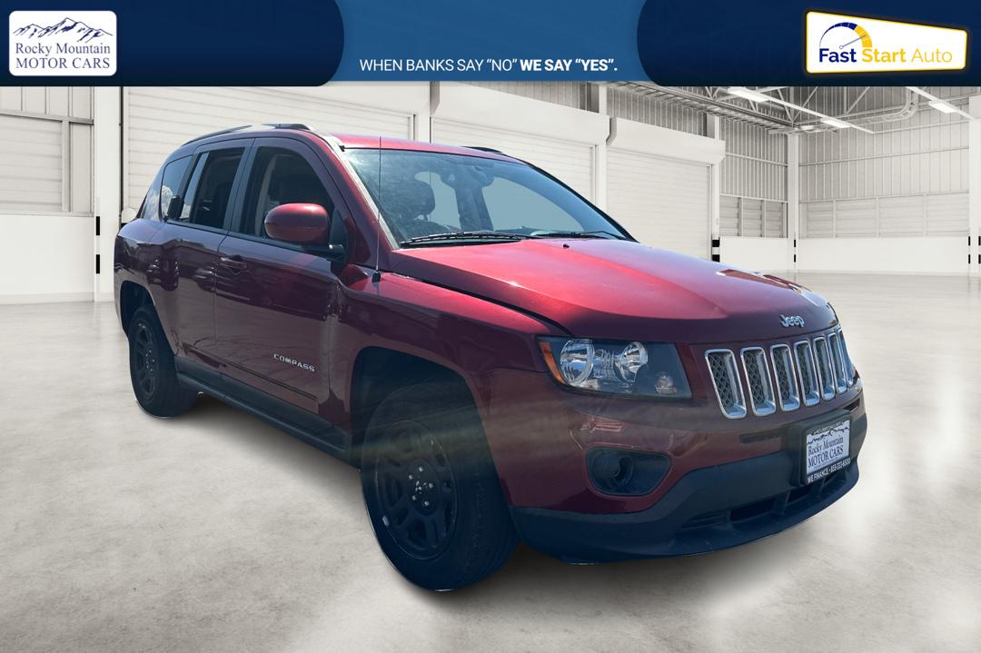 2017 Red Jeep Compass Latitude FWD (1C4NJCEB3HD) with an 2.4L L4 DOHC 16V engine, CVT transmission, located at 767 S State Road, Pleasant Grove, UT, 84062, (801) 785-1058, 40.354839, -111.736687 - Photo#0