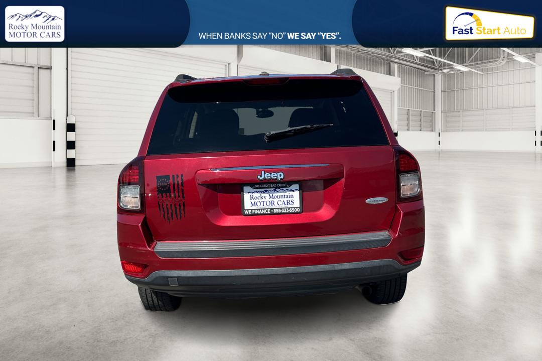 2017 Red Jeep Compass Latitude FWD (1C4NJCEB3HD) with an 2.4L L4 DOHC 16V engine, CVT transmission, located at 767 S State Road, Pleasant Grove, UT, 84062, (801) 785-1058, 40.354839, -111.736687 - Photo#4
