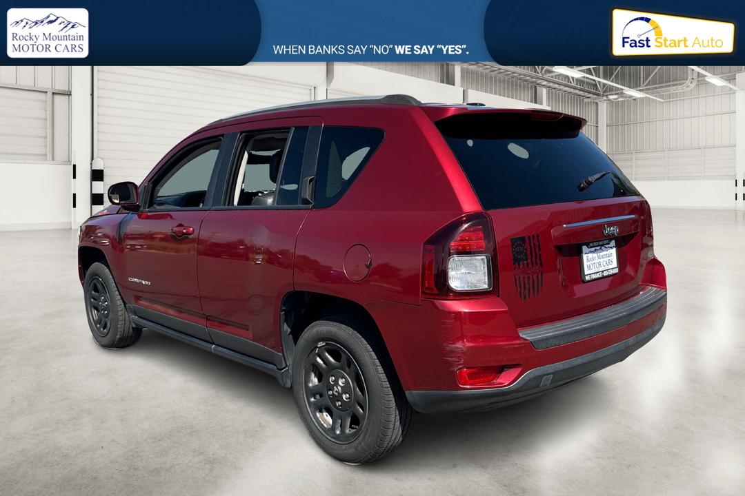 2017 Red Jeep Compass Latitude FWD (1C4NJCEB3HD) with an 2.4L L4 DOHC 16V engine, CVT transmission, located at 767 S State Road, Pleasant Grove, UT, 84062, (801) 785-1058, 40.354839, -111.736687 - Photo#5