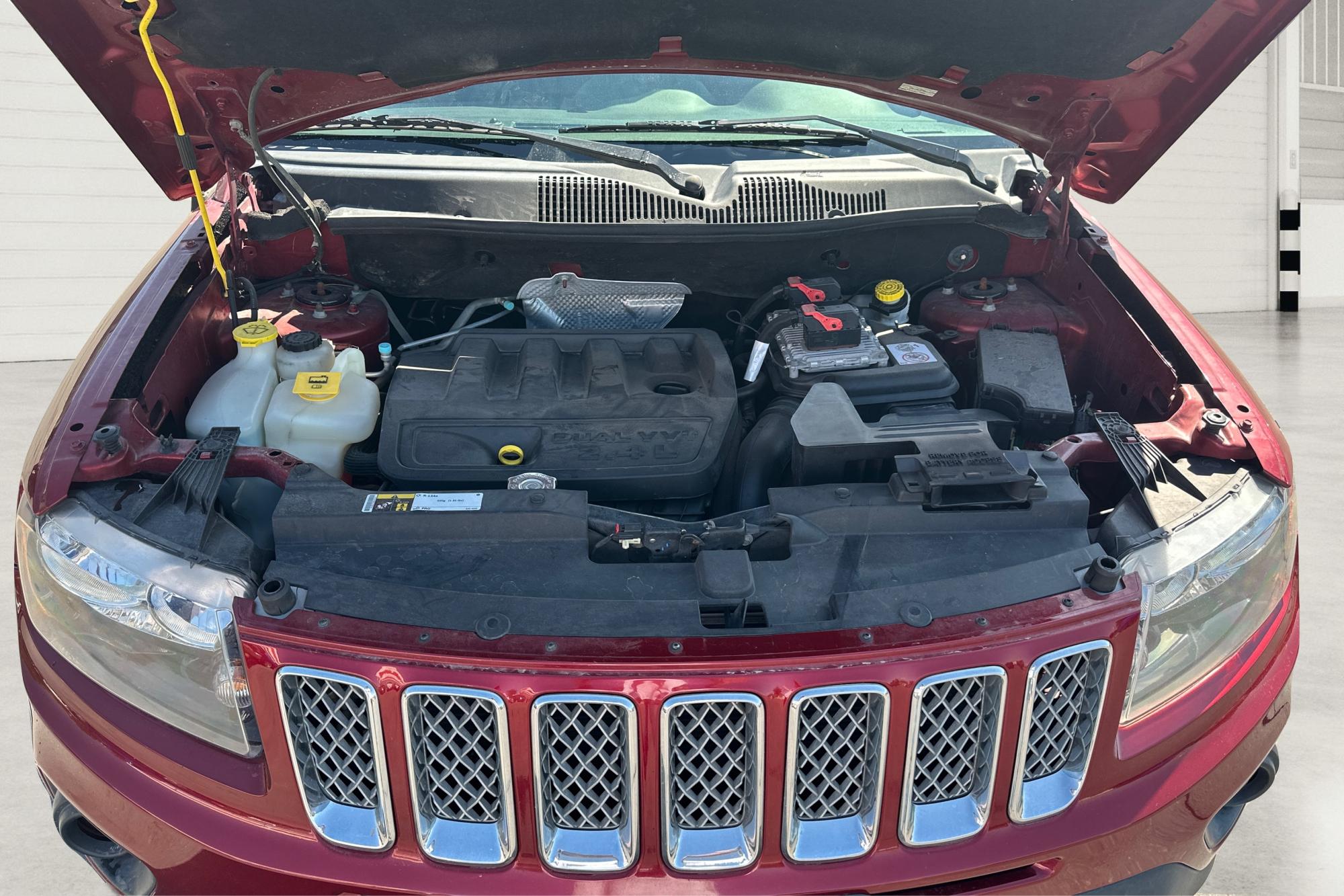 2017 Red Jeep Compass Latitude FWD (1C4NJCEB3HD) with an 2.4L L4 DOHC 16V engine, CVT transmission, located at 767 S State Road, Pleasant Grove, UT, 84062, (801) 785-1058, 40.354839, -111.736687 - Photo#10