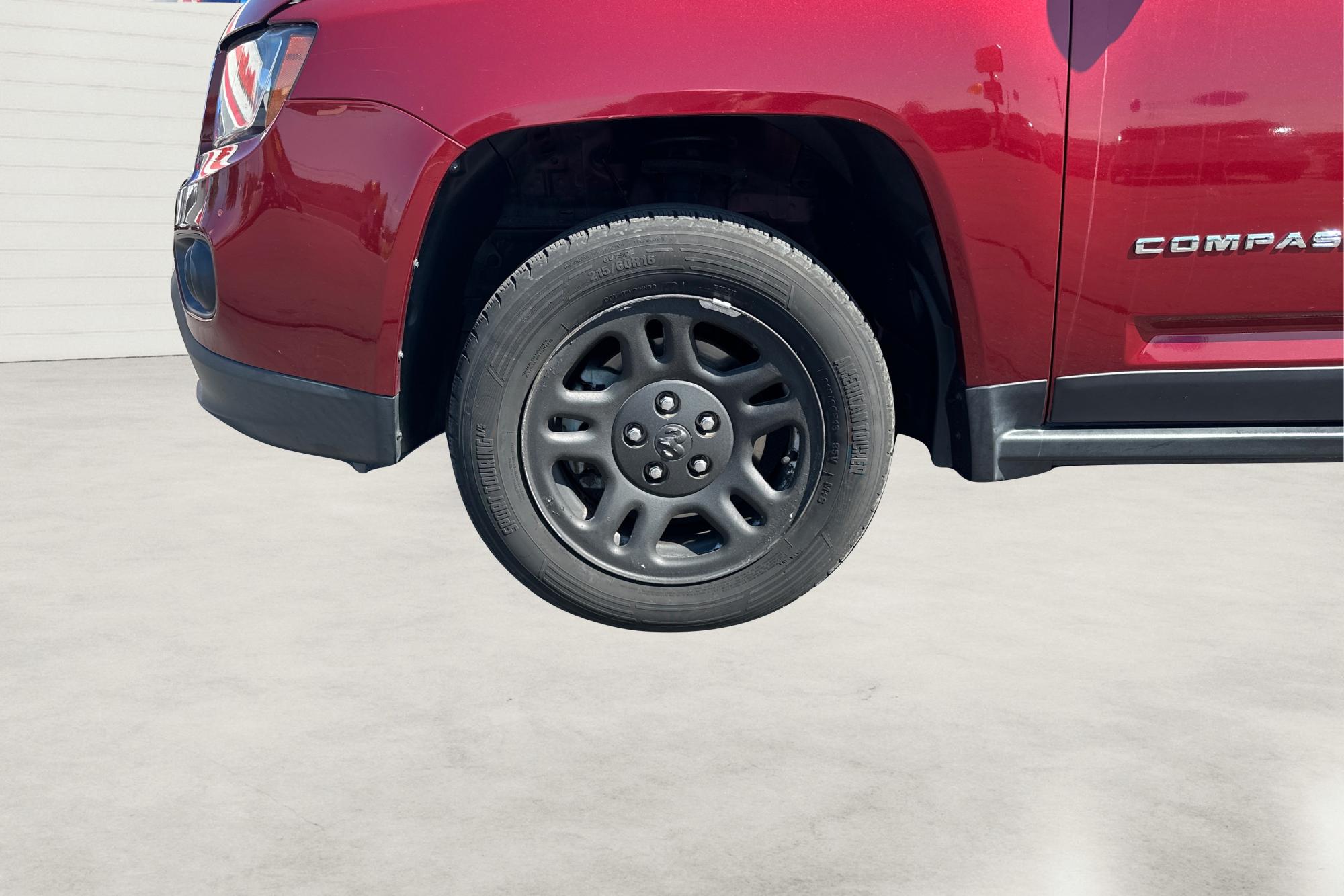 2017 Red Jeep Compass Latitude FWD (1C4NJCEB3HD) with an 2.4L L4 DOHC 16V engine, CVT transmission, located at 767 S State Road, Pleasant Grove, UT, 84062, (801) 785-1058, 40.354839, -111.736687 - Photo#12