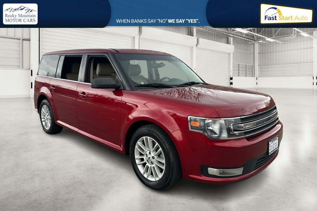 2014 Red Ford Flex SEL FWD (2FMGK5C89EB) with an 3.5L V6 DOHC 24V engine, 6-Speed Automatic Overdrive transmission, located at 767 S State Road, Pleasant Grove, UT, 84062, (801) 785-1058, 40.354839, -111.736687 - Photo #0