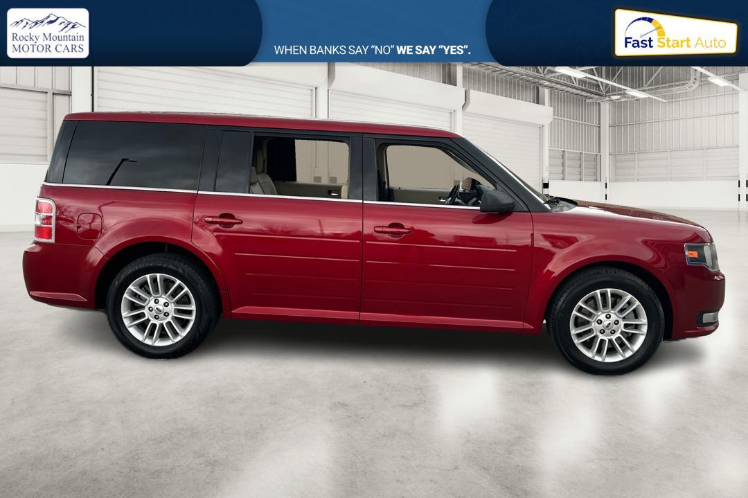 2014 Red Ford Flex SEL FWD (2FMGK5C89EB) with an 3.5L V6 DOHC 24V engine, 6-Speed Automatic Overdrive transmission, located at 767 S State Road, Pleasant Grove, UT, 84062, (801) 785-1058, 40.354839, -111.736687 - Photo #1