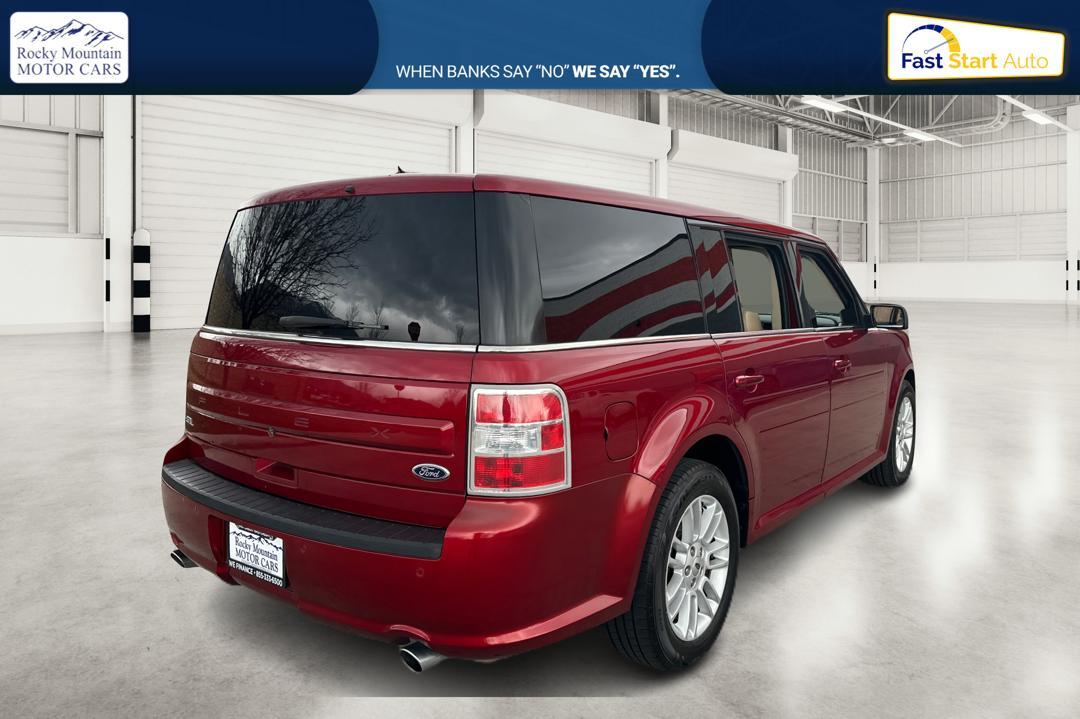 2014 Red Ford Flex SEL FWD (2FMGK5C89EB) with an 3.5L V6 DOHC 24V engine, 6-Speed Automatic Overdrive transmission, located at 767 S State Road, Pleasant Grove, UT, 84062, (801) 785-1058, 40.354839, -111.736687 - Photo #2