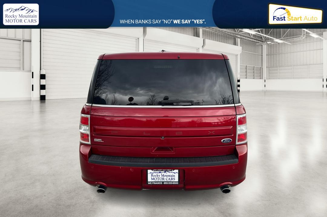 2014 Red Ford Flex SEL FWD (2FMGK5C89EB) with an 3.5L V6 DOHC 24V engine, 6-Speed Automatic Overdrive transmission, located at 767 S State Road, Pleasant Grove, UT, 84062, (801) 785-1058, 40.354839, -111.736687 - Photo #3