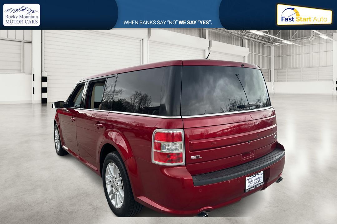 2014 Red Ford Flex SEL FWD (2FMGK5C89EB) with an 3.5L V6 DOHC 24V engine, 6-Speed Automatic Overdrive transmission, located at 767 S State Road, Pleasant Grove, UT, 84062, (801) 785-1058, 40.354839, -111.736687 - Photo #4