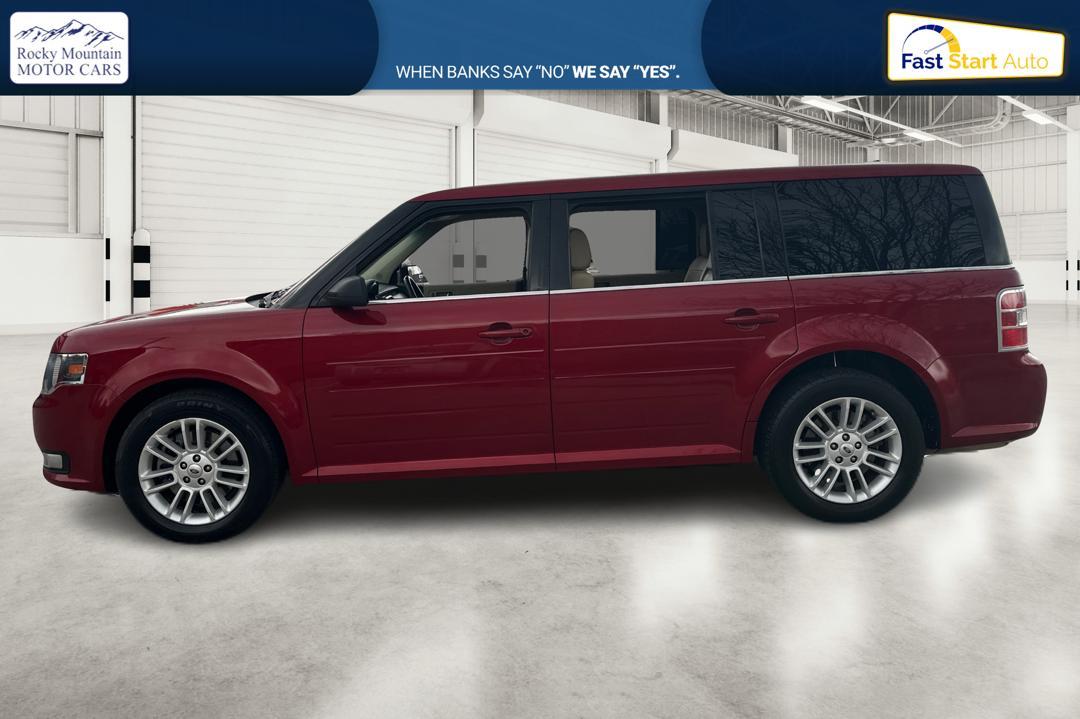 2014 Red Ford Flex SEL FWD (2FMGK5C89EB) with an 3.5L V6 DOHC 24V engine, 6-Speed Automatic Overdrive transmission, located at 767 S State Road, Pleasant Grove, UT, 84062, (801) 785-1058, 40.354839, -111.736687 - Photo #5