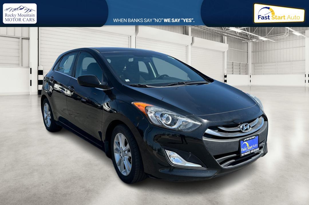 2013 Black Hyundai Elantra GT A/T (KMHD35LE0DU) with an 1.8L L4 16V DOHC engine, 6-Speed Automatic transmission, located at 7755 State Street, Midvale, UT, 84047, (801) 753-9063, 40.610329, -111.892159 - Photo #0