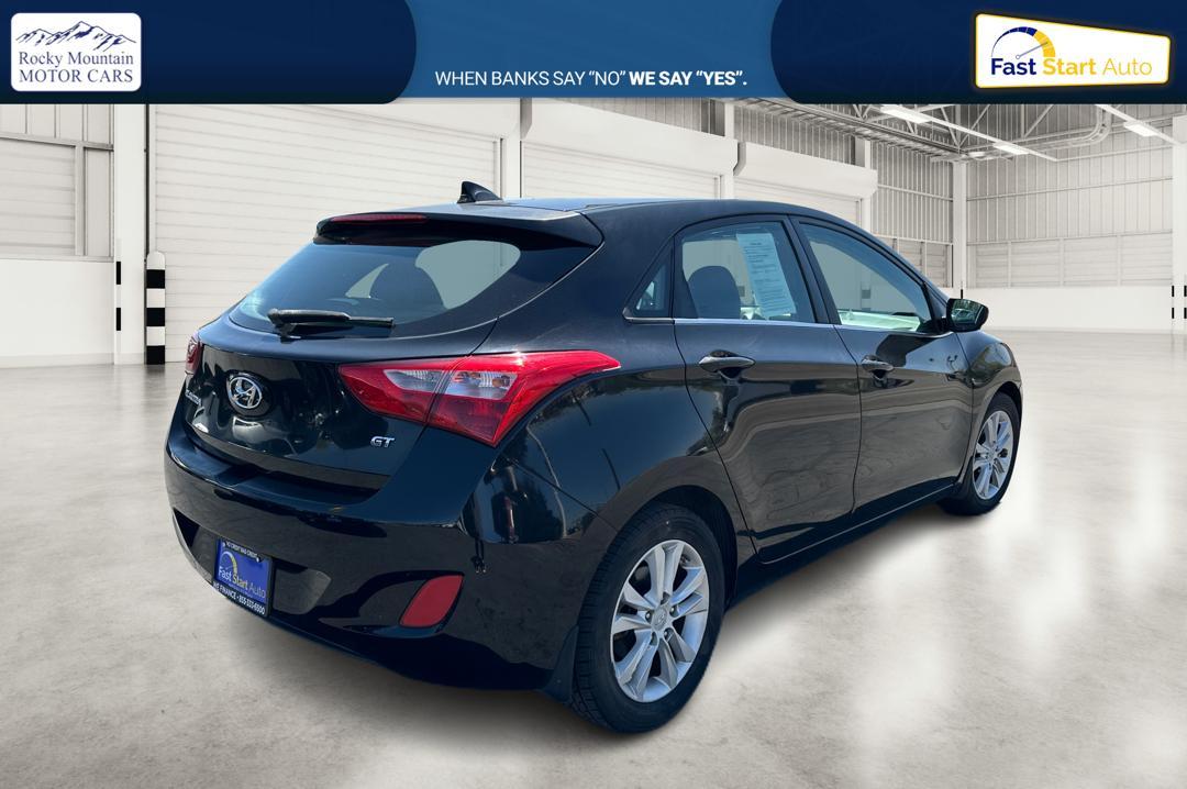 2013 Black Hyundai Elantra GT A/T (KMHD35LE0DU) with an 1.8L L4 16V DOHC engine, 6-Speed Automatic transmission, located at 7755 State Street, Midvale, UT, 84047, (801) 753-9063, 40.610329, -111.890656 - Photo #2
