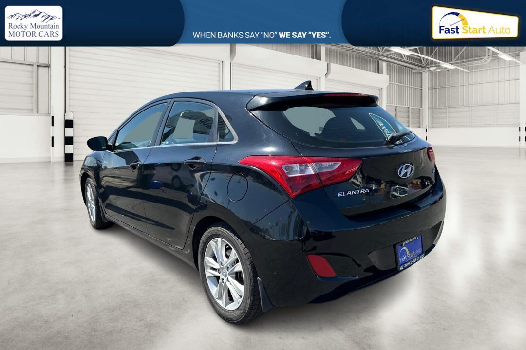 2013 Black Hyundai Elantra GT A/T (KMHD35LE0DU) with an 1.8L L4 16V DOHC engine, 6-Speed Automatic transmission, located at 7755 State Street, Midvale, UT, 84047, (801) 753-9063, 40.610329, -111.890656 - Photo #4