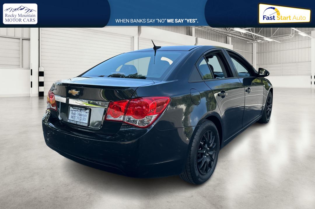 2013 Black Chevrolet Cruze LS Manual (1G1PB5SH3D7) with an 1.8L L4 DOHC 16V FFV engine, 6-Speed Manual transmission, located at 767 S State Road, Pleasant Grove, UT, 84062, (801) 785-1058, 40.354839, -111.736687 - Photo#2