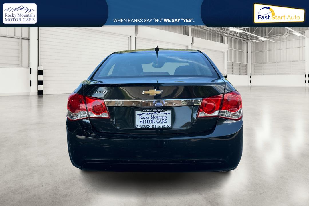 2013 Black Chevrolet Cruze LS Manual (1G1PB5SH3D7) with an 1.8L L4 DOHC 16V FFV engine, 6-Speed Manual transmission, located at 767 S State Road, Pleasant Grove, UT, 84062, (801) 785-1058, 40.354839, -111.736687 - Photo#4