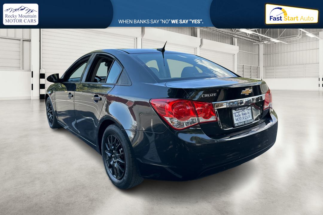 2013 Black Chevrolet Cruze LS Manual (1G1PB5SH3D7) with an 1.8L L4 DOHC 16V FFV engine, 6-Speed Manual transmission, located at 767 S State Road, Pleasant Grove, UT, 84062, (801) 785-1058, 40.354839, -111.736687 - Photo#5