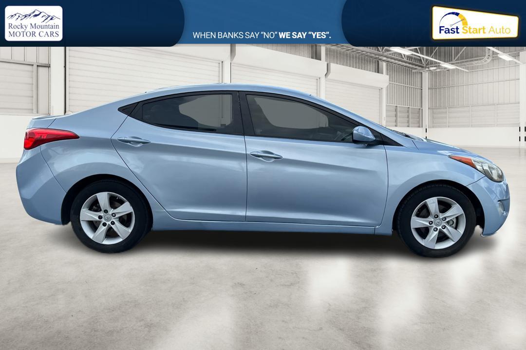 2013 Blue Hyundai Elantra GLS A/T (KMHDH4AE2DU) with an 1.8L L4 DOHC 16V engine, 6-Speed Automatic transmission, located at 7755 State Street, Midvale, UT, 84047, (801) 753-9063, 40.610329, -111.892159 - Photo #1