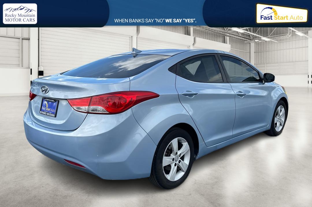 2013 Blue Hyundai Elantra GLS A/T (KMHDH4AE2DU) with an 1.8L L4 DOHC 16V engine, 6-Speed Automatic transmission, located at 7755 State Street, Midvale, UT, 84047, (801) 753-9063, 40.610329, -111.892159 - Photo #2