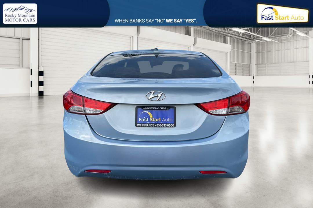 2013 Blue Hyundai Elantra GLS A/T (KMHDH4AE2DU) with an 1.8L L4 DOHC 16V engine, 6-Speed Automatic transmission, located at 7755 State Street, Midvale, UT, 84047, (801) 753-9063, 40.610329, -111.892159 - Photo #3
