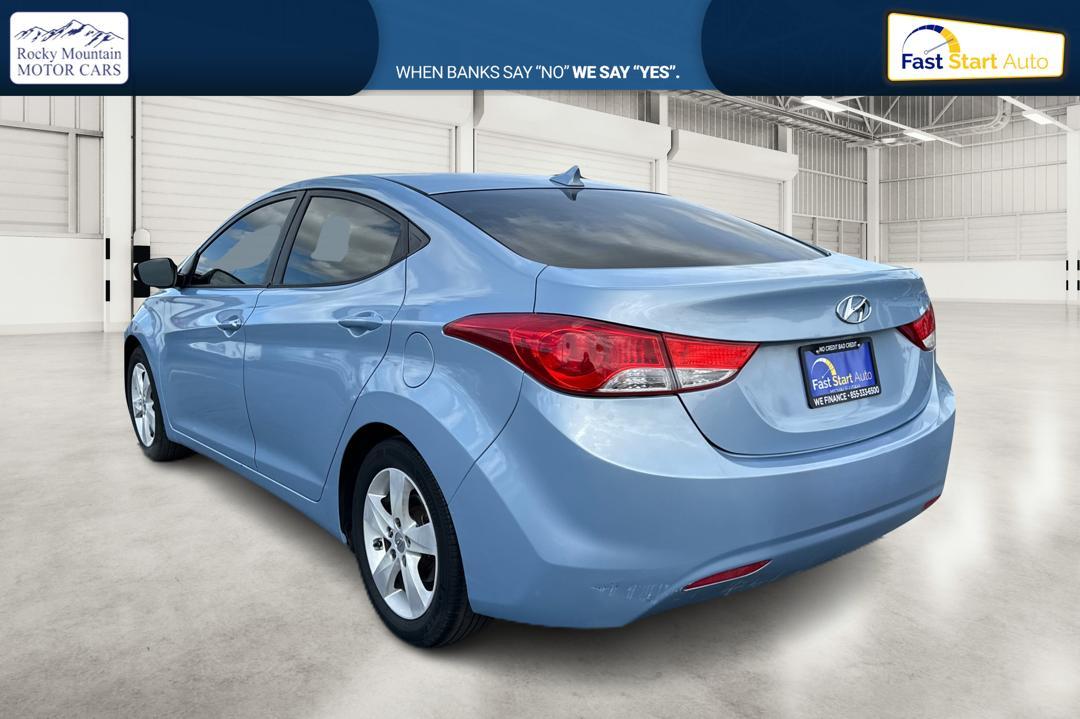 2013 Blue Hyundai Elantra GLS A/T (KMHDH4AE2DU) with an 1.8L L4 DOHC 16V engine, 6-Speed Automatic transmission, located at 7755 State Street, Midvale, UT, 84047, (801) 753-9063, 40.610329, -111.892159 - Photo #4