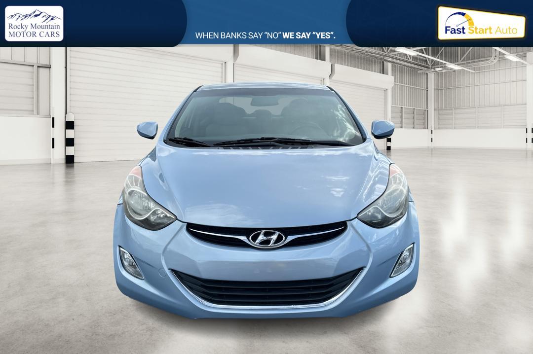 2013 Blue Hyundai Elantra GLS A/T (KMHDH4AE2DU) with an 1.8L L4 DOHC 16V engine, 6-Speed Automatic transmission, located at 7755 State Street, Midvale, UT, 84047, (801) 753-9063, 40.610329, -111.892159 - Photo #7