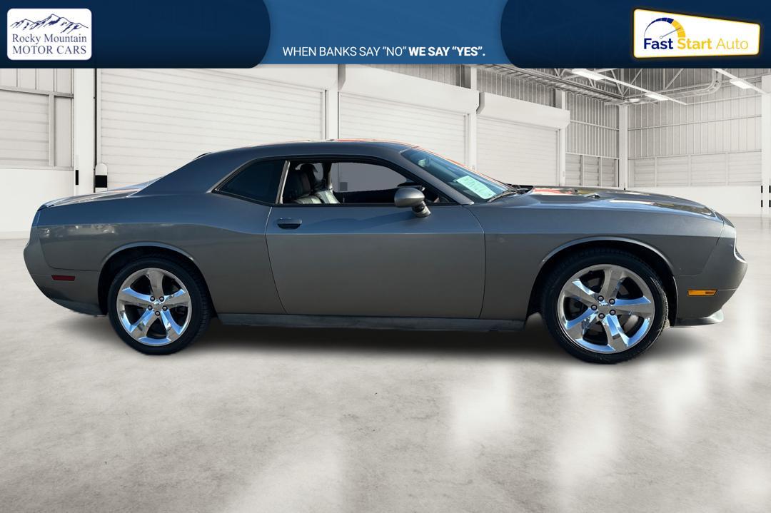 2012 Gray Dodge Challenger SXT (2C3CDYAG7CH) with an 3.6L V6 DOHC 24V engine, 4-Speed Automatic transmission, located at 767 S State Road, Pleasant Grove, UT, 84062, (801) 785-1058, 40.354839, -111.736687 - Photo #1