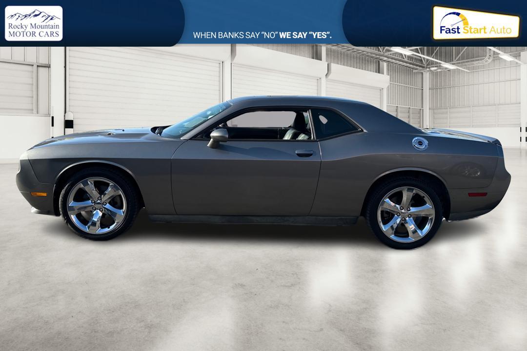 2012 Gray Dodge Challenger SXT (2C3CDYAG7CH) with an 3.6L V6 DOHC 24V engine, 4-Speed Automatic transmission, located at 767 S State Road, Pleasant Grove, UT, 84062, (801) 785-1058, 40.354839, -111.736687 - Photo #5