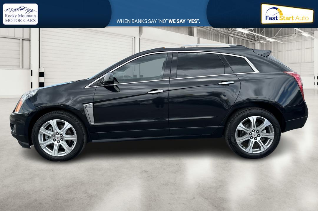 2013 Black Cadillac SRX Luxury AWD (3GYFNDE32DS) with an 3.6L V6 DOHC 24V FFV engine, 6-Speed Automatic transmission, located at 7755 State Street, Midvale, UT, 84047, (801) 753-9063, 40.610329, -111.890656 - Photo #5