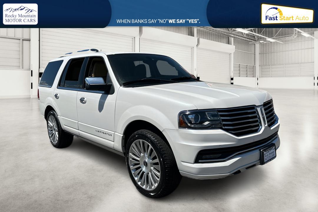 2015 White Lincoln Navigator 4WD (5LMJJ2JT6FE) with an 3.5L V6 DOHC 24V FFV engine, 6-Speed Automatic transmission, located at 767 S State Road, Pleasant Grove, UT, 84062, (801) 785-1058, 40.354839, -111.736687 - Photo #0