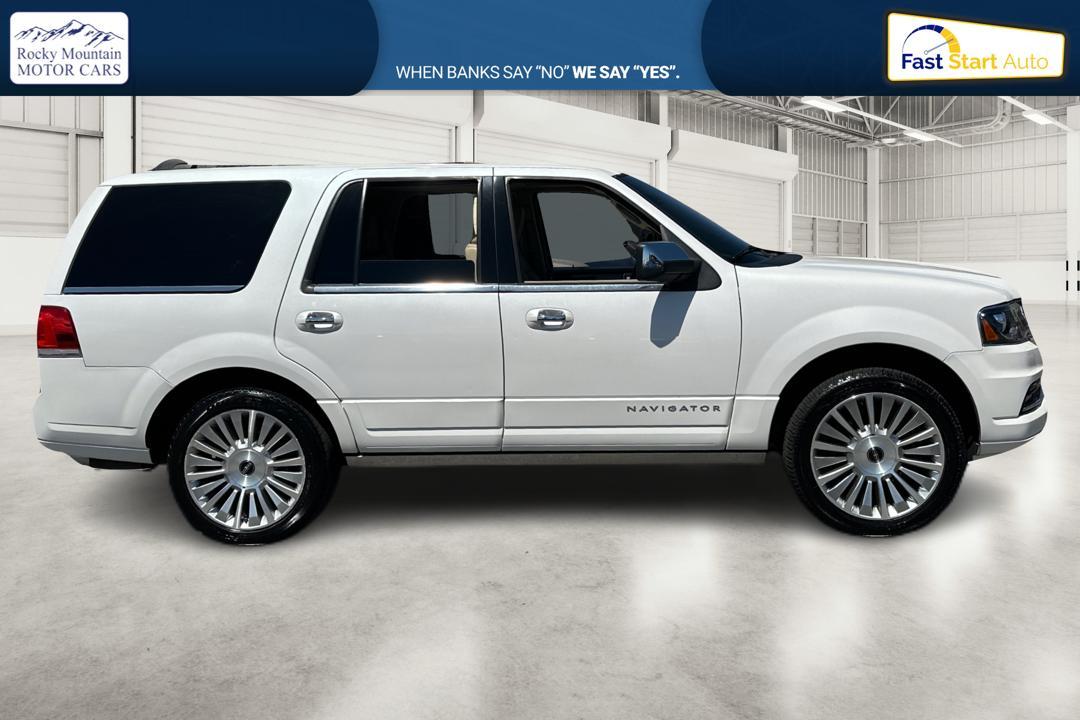 2015 White Lincoln Navigator 4WD (5LMJJ2JT6FE) with an 3.5L V6 DOHC 24V FFV engine, 6-Speed Automatic transmission, located at 767 S State Road, Pleasant Grove, UT, 84062, (801) 785-1058, 40.354839, -111.736687 - Photo #1