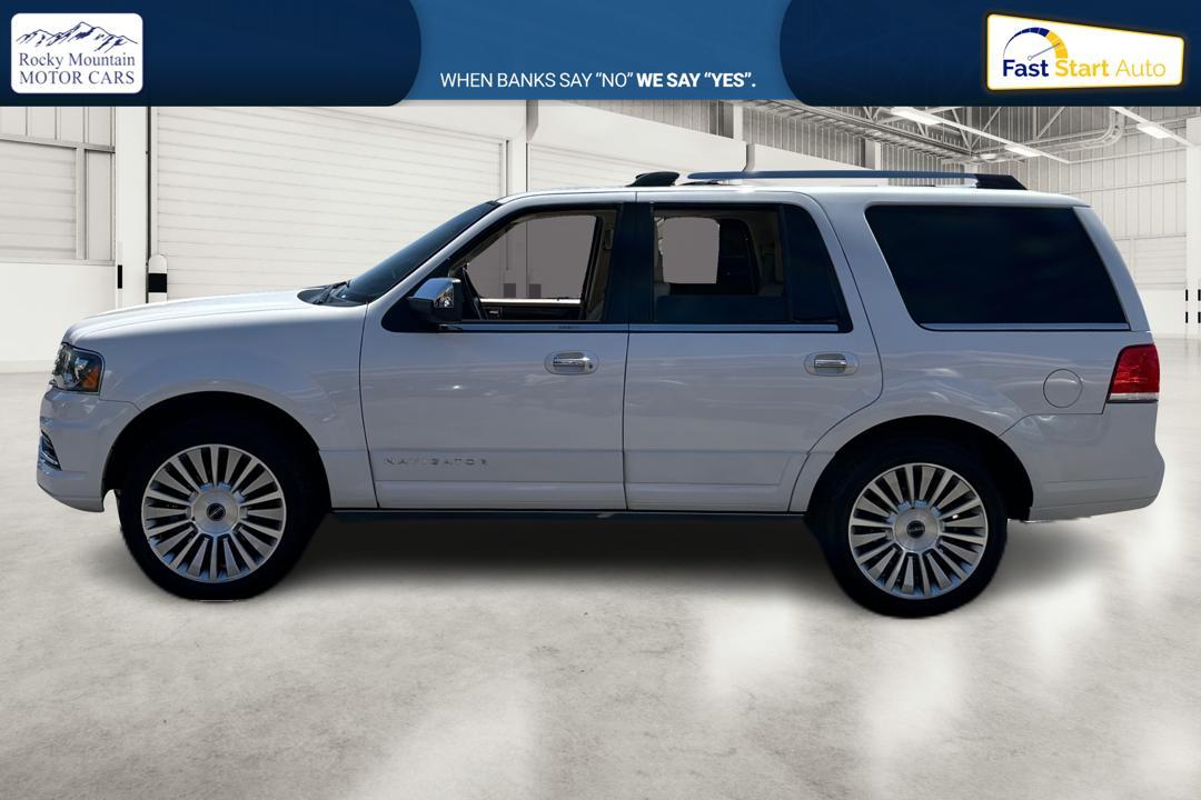 2015 White Lincoln Navigator 4WD (5LMJJ2JT6FE) with an 3.5L V6 DOHC 24V FFV engine, 6-Speed Automatic transmission, located at 767 S State Road, Pleasant Grove, UT, 84062, (801) 785-1058, 40.354839, -111.736687 - Photo #5