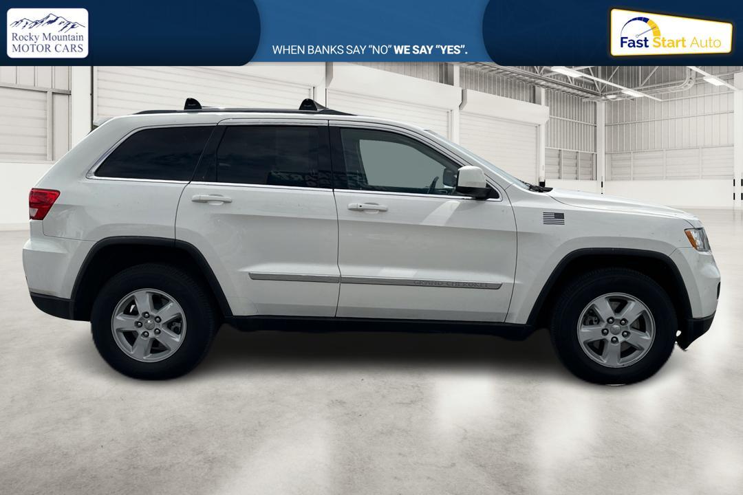 2012 White Jeep Grand Cherokee Laredo 4WD (1C4RJFAG7CC) with an 3.6L V6 DOHC 24V engine, 5-Speed Automatic transmission, located at 7755 State Street, Midvale, UT, 84047, (801) 753-9063, 40.610329, -111.890656 - Photo #1