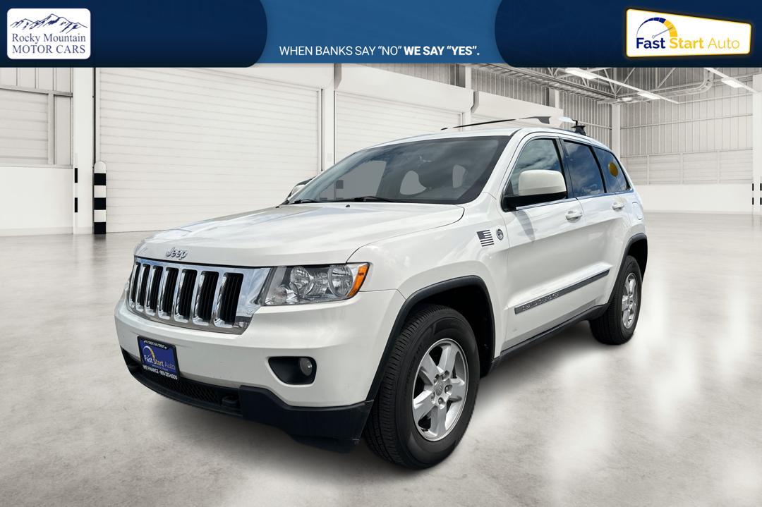 2012 White Jeep Grand Cherokee Laredo 4WD (1C4RJFAG7CC) with an 3.6L V6 DOHC 24V engine, 5-Speed Automatic transmission, located at 7755 State Street, Midvale, UT, 84047, (801) 753-9063, 40.610329, -111.892159 - Photo #6