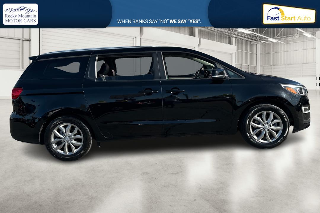 2019 Black Kia Sedona LX (KNDMB5C15K6) with an 3.3L V6 DOHC 24V engine, 6A transmission, located at 767 S State Road, Pleasant Grove, UT, 84062, (801) 785-1058, 40.354839, -111.736687 - Photo#1