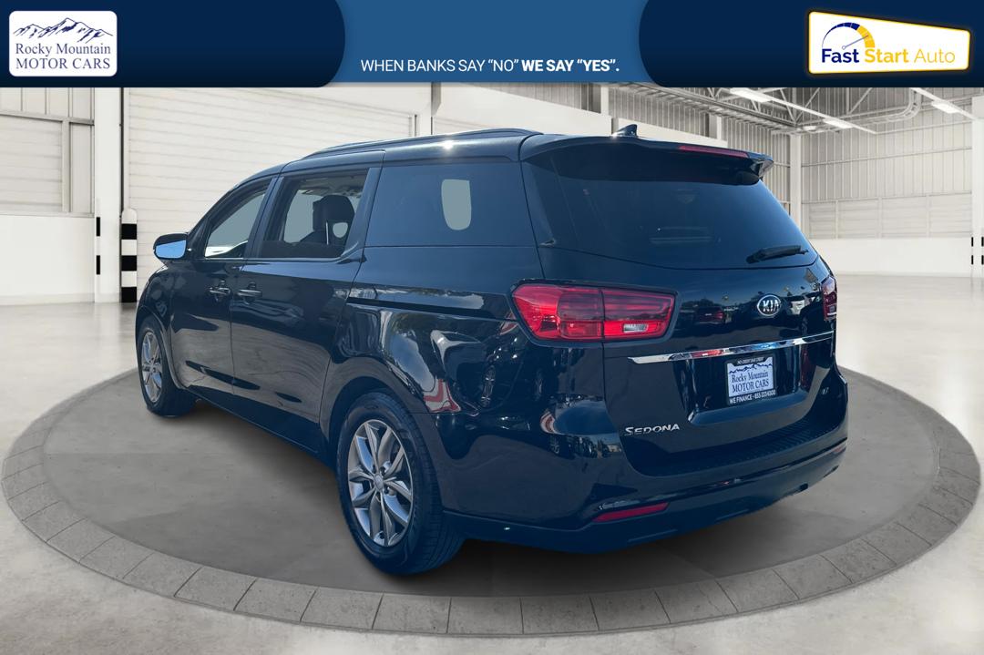 2019 Black Kia Sedona LX (KNDMB5C15K6) with an 3.3L V6 DOHC 24V engine, 6A transmission, located at 767 S State Road, Pleasant Grove, UT, 84062, (801) 785-1058, 40.354839, -111.736687 - Photo#4