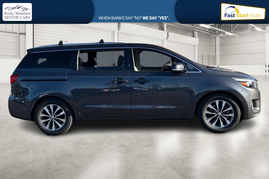 2016 Gray Kia Sedona EX (KNDMC5C18G6) with an 3.3L V6 DOHC 24V engine, 6-Speed Automatic transmission, located at 767 S State Road, Pleasant Grove, UT, 84062, (801) 785-1058, 40.354839, -111.736687 - Photo #1