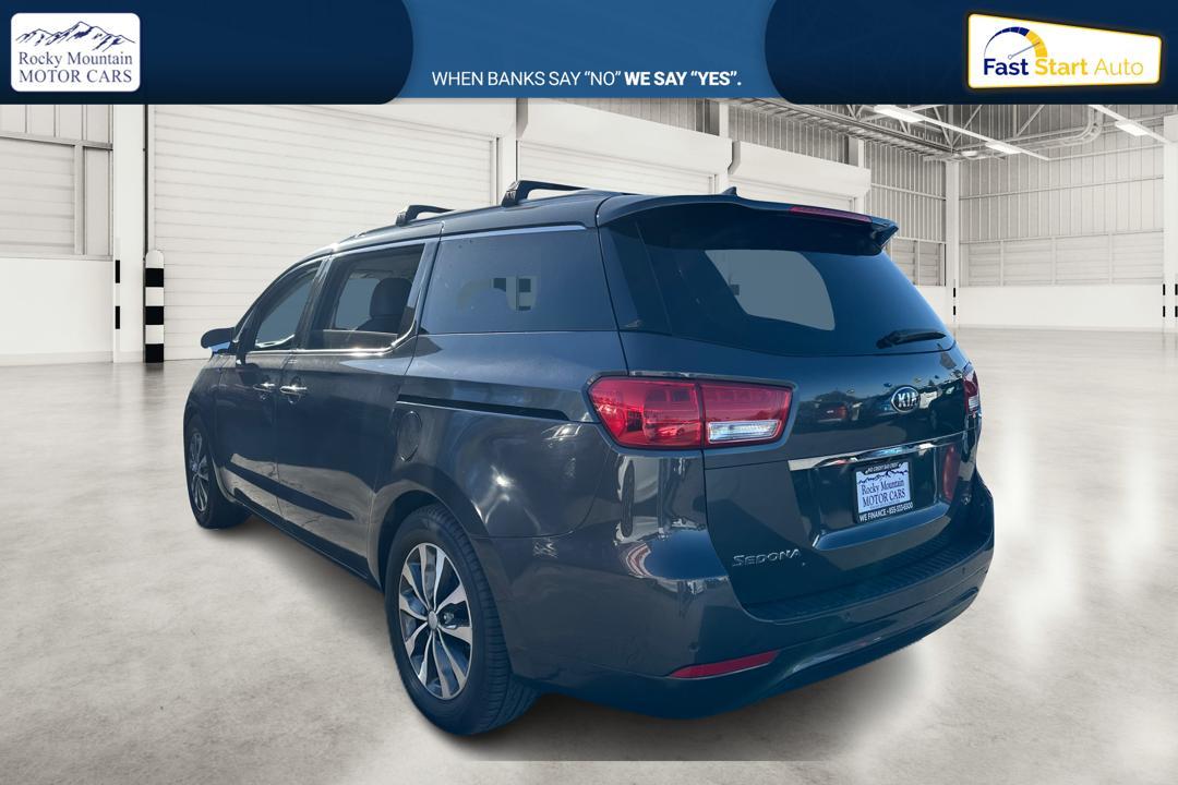 2016 Gray Kia Sedona EX (KNDMC5C18G6) with an 3.3L V6 DOHC 24V engine, 6-Speed Automatic transmission, located at 767 S State Road, Pleasant Grove, UT, 84062, (801) 785-1058, 40.354839, -111.736687 - Photo #4