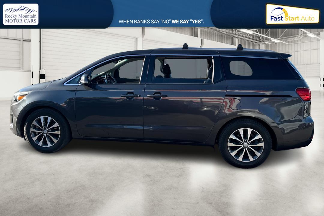 2016 Gray Kia Sedona EX (KNDMC5C18G6) with an 3.3L V6 DOHC 24V engine, 6-Speed Automatic transmission, located at 767 S State Road, Pleasant Grove, UT, 84062, (801) 785-1058, 40.354839, -111.736687 - Photo #5