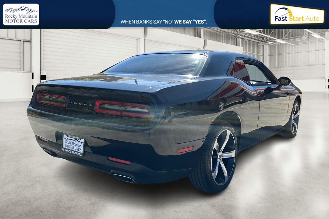 2016 Black Dodge Challenger SXT (2C3CDZAG0GH) with an 3.6L V6 DOHC 24V engine, 5A transmission, located at 767 S State Road, Pleasant Grove, UT, 84062, (801) 785-1058, 40.354839, -111.736687 - Photo #2
